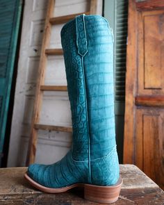 R. Watson presents these 17″ top and bottom turquoise sueded American alligator. These boots have the R. Watson comfort system, all leather stacked heel, counters, solid steel shank, and 10 iron outsole. 13″ total in height. ADDITIONAL INFORMATION Heel Cowboy Toe Narrow Square Top American Alligator Top Color Turquoise Vamp American Alligator Vamp Color Turquoise Combat Boots Heels, American Alligator, Knit Swimwear, Felt Cowboy Hats, Straw Cowboy Hat, Concert Fashion, Heeled Mules Sandals, Square Top, Boot Jewelry