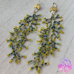 Details: 🌩️Beads are professional quality Japanese and Czech glass seed beads. 🌩️Moon charm is made of brass. 🌩️Star beads are made from glass with a matte aurora borealis finish, they shine like rainbows in the sun! 🌩️Ear hooks are 22kt gold plated brass, lead and nickel free- they are safe for sensitive ears! 🌩️Thread is strong, Japanese nylon made for beading. 🌩️Length from top of the hook to the longest fringe is 6 inches. 🌩️Each earring is approx .28 oz or 8g, making them lightweight and easy to wear! 🌩️Feel free to email or message me with any questions :) You can find more of my work on Facebook, Instagram, and TikTok: https://facebook.com/inkray.art https://www.instagram.com/inkray.beadwork/ tiktok.com/@inkray.beadwork Adjustable Iridescent Beaded Earrings, Iridescent Beaded Dangle Earrings, Faceted Dangle Beads For Jewelry Making, Iridescent Beaded Jewelry For Festivals, Star Beads, Coral Earrings, Long Fringes, Moon Charm, Glass Seed Beads