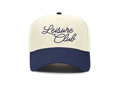 Grab your new favorite vacation hat for summer with our navy "Leisure Club" SnapBack two tone hat. Perfect for the rodeo, summer country concert or a day on the river. ---------------------- Product Details: 5 Panel Snapback Natural and Blue Brim * Classic snapback cap with premium wool blend fabric * Hard buckram. Structured * Contrasting plastic snapback closure * Contrasting eyelets and top button * ---------------------- Product Features: - Material: 8 oz./yd² (US) 13.3 oz., 50/50 cotton/pol Navy Adjustable Baseball Cap For Summer, Summer Baseball Cap With Embroidered Logo And Short Brim, Blue Dad Hat With Embroidered Logo For Summer, Navy Snapback Hats For Beach, Navy Summer Baseball Cap, Blue Trucker Hat With Embroidered Logo For Summer, Navy Snapback Hat For Summer, Navy Summer Snapback Hat, Hat For Summer