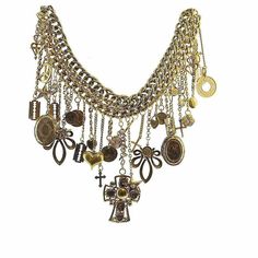 As Seen on Beyonce.Dangling charms, with crosses, lockets, flowerss, and star motifs embellish this woven chain link necklace.Gold vermiel, approx 16" in length with 4 inch drop. Gold VermielHand CraftedMade in USA Bohemian Dangle Charm Necklaces, Bohemian Charm Dangle Necklaces With Chain, Erickson Beamon, Woven Chain, Gift Card Sale, Chain Link Necklace, Link Necklace, Beyonce, Necklace Gold