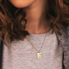 ELEGANT ENGRAVED RECTANGLE NECKLACE Latest trend and add to our contemporary collection this elegant engraved rectangle necklace. A sophisticated, delicate profile holds a unique meaning: up to four names engraved with a heart. An extraordinary gift to treat somebody you love. CHARACTER LIMIT Max 10 letters per name ITEM SPECIFICATIONS • Finish: 18K Gold ∙ 925 Sterling Silver ∙ Rose Gold• Dimensions: Adjustable Length Chain 15” | Pendant 12x18mm Unique Meaning, Rectangle Necklace, Mom Jewelry, Latest Trend, Necklace Personalized, Coin Necklace, Minimalist Necklace, Personalized Necklace, Silver Rose Gold