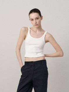 This is a casual and minimal top by NOTHING WRITTEN that is made out of high quality and sturdy material. With distinctive mood of the design and comfortable wear, you can style it for your casual daily outfit.- Printed inner label for comfortable wear- Curved neckline and clean silhouette- Casual and trendy minimal mood Modern Cropped Top For Everyday Wear, White Fitted Tank Top For Everyday, Minimalist Tank Top For Spring Everyday Wear, Versatile White Crop Top For Everyday, Minimalist Cropped Tops For Everyday, Minimalist Spring Tank Top For Everyday, Versatile White Everyday Crop Top, Stretch Minimalist Tops For Summer, Minimalist Stretch Tops For Summer