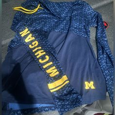 Tightly Fitted - Fits More Like A Large. Perfect Athleisure Top For Michigan Games Cowl Neck Shirt, University Of Michigan Wolverines, Athleisure Tops, University Of Michigan, Michigan Wolverines, Neck Shirt, Shirt Color, Blue Gold, Cowl Neck