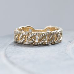 There is so much to admire about this ring: its glimmering round cut diamonds, its graceful linked metal loops, and its master craftsmanship. It is wider than other stackers, but looks sophisticated paired with thinner rings as well.  6.0 mm band 0.25 carats total available in rose, yellow and white gold (select size and metal at checkout) Questions? Want to modify this ring? Let us know. Made to order in the USA. All our sales are final. @goodstone_inc Luxury Yellow Gold Stackable Rings With Accent Stones, Luxury Timeless Yellow Gold Stackable Rings, Luxury Gold Hallmarked Stackable Rings, Luxury Hallmarked Yellow Gold Stackable Rings, Elegant 14k Gold-filled Yellow Stackable Rings, Round Cut, Dream Ring, Round Cut Diamond, Wedding Rings