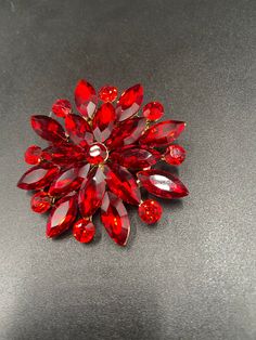 Red stones saree pin/ brooch Handmade jewelry  Silver plated jewelry  One gram gold jewelry  🌸 C O N N E C T . W I T H . U S  🌸 Please share/ tag us with your photos adorning our jewelry on our social media pages : https://www.pinterest.com/globusfashions https://www.instagram.com/globusfashions https://www.facebook.com/globusfashions 🌸 C A R E . T I P S  🌸 We don't want your special moments to fade. To maintain the quality of your jewelry, please : - Do not wear it to the pool, spa, or the Traditional Brooch Jewelry For Party, Traditional Party Brooch Jewelry, Traditional Party Jewelry With Brooch, Red Costume Jewelry Brooch, Red Formal Costume Jewelry Brooches, Red Brooch Jewelry For Formal Occasions, Traditional Red Brooch For Gift, Traditional Red Brooches For Gifts, Saree Pin