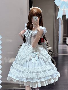 Full set includes a dress, a choker and a bowknot train.  This enchanting dress features intricate bead chain bowknots that add a touch of sophistication to its classic Lolita design. The back is thoughtfully designed with shirring and a lace-up, ensuring a comfortable and customizable fit for all body types. The delicate blue hue further enhances its dreamy and ethereal appeal, making it a must-have addition to your wardrobe.  SizeSMLFull Length95.59798.5Waist646872Bust808488 Fitted Blue Kawaii Dress, Harajuku Style Blue Costume Dress, Blue Princess Dress, Blue Kawaii Dress With Doll Collar, Elegant Floral Dress, Blue Harajuku Dress With Ruffles, Blue Kawaii Doll Collar Dress, Steampunk Fashion Male, Gothic Skirts