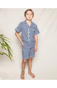 Navy gingham and piped trim underscore the classic style of button-up short pajamas cut in a brushed cotton blend to keep him comfy on warm nights. Meets Consumer Product Safety Commission's flammability standards for children's sleepwear 65% cotton, 35% modacrylic Machine wash, tumble dry Imported Kids' Wear Pajama Short Set, Pajama Short, Short Pajamas, Navy Gingham, Gingham Shorts, Gingham Pattern, Pattern White, Shoe Size Conversion, Gingham Print