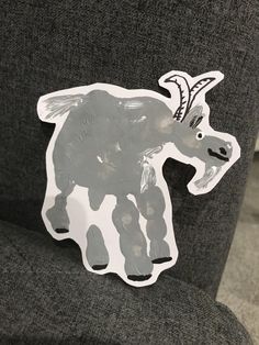 an animal sticker on the back of a chair