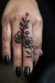 Hand with floral tattoo on fingers and black nail polish. Western Finger Tattoos For Women, Finger Tattoo Cover Up, Upper Inner Arm Tattoo, Finger Tattoo Designs For Women, Cover Up Finger Tattoos, Finger Tattoos For Men, Finger Tattoos Fade, Inside Finger Tattoos, Minimalist Symbols