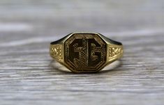 The Caledonia Antique Signed Yellow Gold Signet Ring. This signet ring is crafted in yellow gold and features the initials FG. The ring is signed by the maker, however we have not identified who yet. Currently a finger size 6, this ring can be resized for an additional charge. Each piece has been hand selected and meticulously identified and graded by a Graduate Gemologist who has been awarded a degree by the Gemological Institute of America (GIA). Please visit our Shop's About Page or our websi Collectible Yellow Gold Signet Ring With Initials, Heirloom Yellow Gold Engraved Initial Ring, Heirloom Engraved Initial Ring In Yellow Gold, Yellow Gold Engraved Ring Collectible, Elegant Signet Ring As Collectible, Collectible Yellow Gold Signet Ring With Engraving Option, Victorian Yellow Gold Rings With Engraving Option, Victorian Yellow Gold Ring With Engraving Option, Victorian Style Yellow Gold Rings With Engraving Option