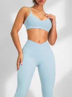 Description: This sports bra is designed to provide minimal yet supportive coverage, ensuring maximum comfort during your workouts. This sports bra offers the perfect balance of style and functionality. All of our sports bras are made out of high quality nylon and are well-padded to provide amazing comfort, coverage & support. Sizing: True to size Color: Sky Blue Fabric: Active Fit Seamless Sky Blue Fabric, Baby Blue Aesthetic, Gym Clothes, 2025 Vision, Padded Bra, New Tops, Blue Aesthetic, Sports Bras