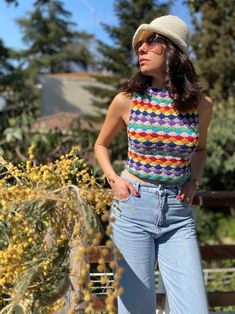 Bohemian Cropped Crochet Top For Spring, Handmade Multicolor Tops For Spring, Bohemian Multicolor Granny Square Top, Bohemian Cropped Crochet Top, Bohemian Multicolor Cropped Tops, Multicolor Cropped Bohemian Tops, Hippie Multicolor Cropped Top, Multicolor Casual Crochet Top For Beach, Multicolor Cropped Hippie Crop Top