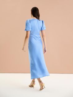 In rich ice blue, Rosie is as effortless as she is elegant. Short balloon sleeves playfully draped in our signature recycled satin add a twist of texture to this classic neckline. Maxi in length and bra-friendly, she’s the perfect bridesmaid, wedding guest or date night dress. Rosie is the dress that does it all. Elegant Blue Puff Sleeve Dress With Fitted Bodice, Elegant Ruched Satin Dress For Brunch, Elegant Puff Sleeve Dress With Fitted Bodice For Bridesmaids, Elegant Blue Puff Sleeve Formal Dress, Elegant Light Blue Fitted Puff Sleeve Dress, Blue Elegant Puff Sleeve Dress With Gathered Sleeves, Elegant Blue Puff Sleeve Dress With Gathered Sleeves, Elegant Light Blue Puff Sleeve Dress, Elegant Light Blue Ruched Midi Dress