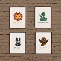 four framed children's art prints on a brick wall