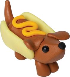 a toy hot dog with mustard and ketchup on it's buns