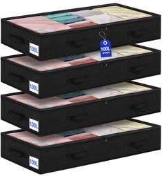 three black storage bins with labels on the top and bottom, each containing file folders