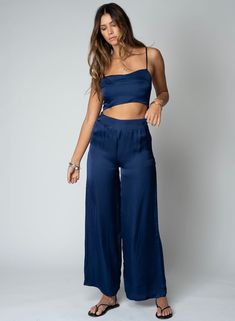 Experience a mix of luxury and style with these silky, high-rises. Boasting side pockets with discreet zippers, our elevated Sunset Wide Leg Pant will be the envy of all! (100% Viscose) Navy Peony, Silky Pants, Silky Top, Wide Leg Pant, Night Wear, Knit Sweatshirt, Linen Blazer, Still Water, Bra Top