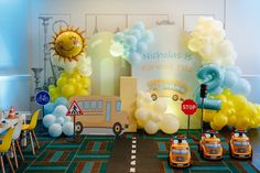 a birthday party with balloons and decorations