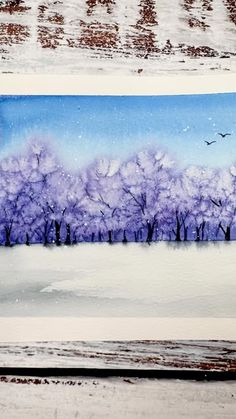 a watercolor painting of trees in the snow