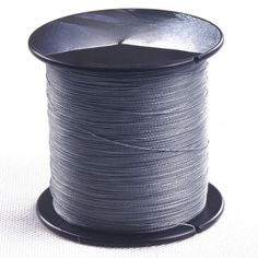 a spool of gray thread on a white background with space for text or image