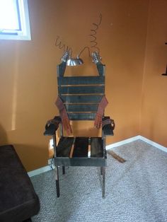 a chair made out of wood sitting in a room