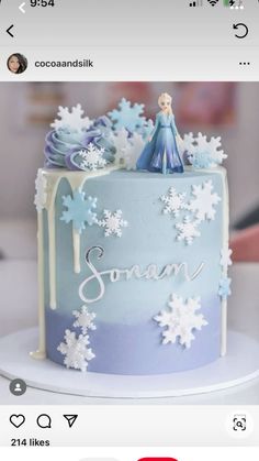 a frozen princess cake with snowflakes on it and the name's frosting