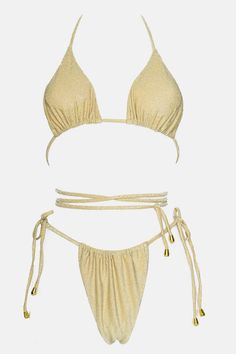 Shimmer fabric Can be worn in multiple ways Wrap around ties Triangle cups with extra long ties Straps can be adjusted in neck and back Sliding cups Double lined Removable padding High-cut leg Adjustable side tie straps Cheeky coverage