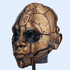 a metal mask with gears and mechanical parts on it's face, against a light blue background