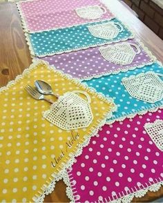 the table is decorated with polka dots and doily, which are used as placemats