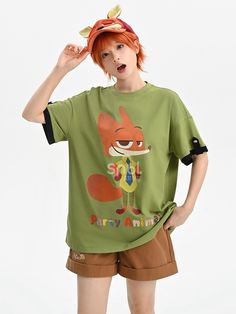 Embrace the charm and wit of Zootopia's favorite fox, Nick Wilde, with this vibrant green unisex T-shirt. Crafted for both comfort and style, this round-neck tee features a high-quality print of the clever and charismatic Nick, making it a perfect addition to any Disney fan's wardrobe. Designed to suit all genders, ensuring a comfortable and flattering fit for everyone.  Garment Size   	 		 			Size 			S 			M 			L 		 		 			Full Length 			66 			68 			71 		 		 			Bust 			108 			112 			117 Green Casual T-shirt With Cartoon Print, Playful Green Cotton T-shirt, Playful Green Crew Neck Top, Green Crew Neck T-shirt For Summer, Green Casual Top With Cartoon Print, Casual Green Tops With Cartoon Print, Casual Green Top With Cartoon Print, Playful Green Spring T-shirt, Trendy Green Cropped T-shirt