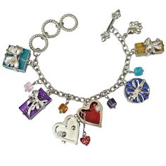 Charm Bracelets "Life's A Gift" - Bracelets For Women This Very Merry Silvertone Fashion Accessory Features A Collection Of Festive Presents That Are Tricked-Out With Beautiful Bows, Rhinestones, And Colorful Enamel. Additional Strands Of Faceted Beads Are Added Into The Mix, Too, For A Glamorous Look. Adjust This Bold Toggle Charm Bracelet With The Toggle Clasp To A Size That Best Suits You. Show Your Love For All Things Christmas By Wearing A Little Holiday Cheer! Did Someone Say Christmas? Th Metal Bracelets With Jewels For Gifts, Luxury Charm Bracelet For Gift, Luxury Charm Bracelet - Perfect Gift, Luxury Charm Bracelet As Gift, Designer Multicolor Jewelry For Gifts, Elegant Multicolor Valentine's Day Jewelry, Fine Jewelry Charms Bracelets As Gift, Fine Jewelry Bracelets With Charms For Gift, Unique Jeweled Bracelet For Gift