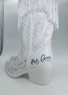 An amazing and original choice to make a statement for parties, daily, weddings, country side music festivals, line dancing, western theme parties, rodeo, or shopping these Customized 2.5-inch heels and classic western embroidery cowboy boots for women's design show elegant Western style. Soft synthetic leather lining wicks away moisture and offers a comfortable next-to-skin feel and cushioning to give feet comfort. Mid-calf cowgirl boots for women are designed with western embroidery, side zipp Wedding Shoes Cowgirl Boots, Disco Cowgirl Wedding, Boho Bride Shoes, Boots And Bling Party Theme, Shoes For Wedding The Bride, Bedazzled Cowboy Boots, Cowboy Theme Wedding, Bride Cowboy Boots, Bridal Cowboy Boots