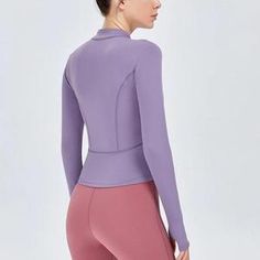 Versatile Long Sleeve Solid Activewear, Versatile Solid Long Sleeve Activewear, Versatile Nylon Long Sleeve Outerwear, Purple Long Sleeve Gym Activewear, Purple Long Sleeve Activewear For Spring, Purple Long Sleeve Activewear For Gym, Purple High Stretch Long Sleeve Activewear, Winter Nylon Tops For Gym, Long Sleeve Nylon Winter Top