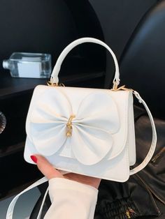 Cute White Satchel With Mobile Phone Bag, White Cute Satchel With Detachable Strap, Cute White Satchel With Detachable Strap, Cute White Satchel With Adjustable Strap, Cute Shoulder Bag For Spring Party, Trendy White Satchel For Gift, Trendy White Satchel As A Gift, White Handheld Satchel As Gift, Cute White Top Handle Bag