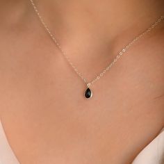 This dainty black Onyx pendant necklace has a delicate silver chain. The chain is solid sterling silver 925., and there is an extension so that the size can be adjusted. There are different stonees to choose from. The stones are natural stones and no 2 are identical, but they are similar. If you would like a custom order or have any questions please contact me, thanks. Onyx Jewelry Necklace Sterling Silver, Minimalist Silver Onyx Necklace, Minimalist Onyx Pendant Necklace, Silver Onyx Necklace With Natural Stones, Silver Oval Onyx Necklace, Onyx Necklace, Onyx Jewelry, Black Onyx, Sterling Silver Necklaces