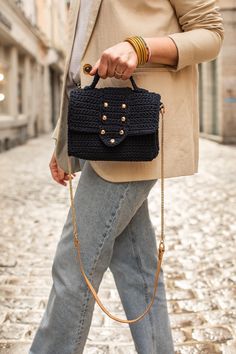 "Meet our navy cross-body bag for women, it is chic and casual with good capacity and an easy carry long leather strap. It will be a beautiful touch to your everyday look. ✔ Our shoulder bag is exclusively handcrafted. ✔ The main material is cotton yarn, we used satin fabric for the lining and pocket. ✔ It comes with 115 cm leather and metal chain strap. ✔ Dimensions : W: 22 cm / 8.6 \" H: 16 cm / 6.3 \" ✂Due to hand work and the nature of the yarn it might show slight measurement and color diff Crochet Messenger Bag, Navy Crossbody Bag, Crochet Crossbody Bag, Winter Bags, Crochet Shoulder Bag, White Shoulder Bag, Shoulder Strap Bag, Handmade Gifts For Her, Bag Cover