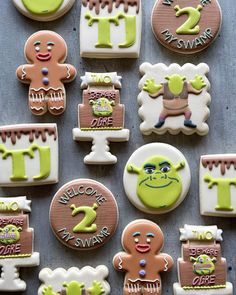 decorated cookies are arranged in the shape of numbers and characters for children's birthdays