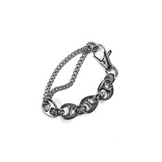 Challenge yourself with this chunky yet smooth chain bracelet. The hand mended smooth pebble shaped links give this bracelet a modern twist on classic grunge. Made of stainless steel, this bracelet is sturdy, waterproof, and will not turn your skin green! This design is finished off with a large swivel lobster clasp closure that can be adjusted along the links should you want an even tighter fit. Available in three sizes. available in 7, 8, and 9 inches stainless steel hand mended links swivel c Trendy Metal Link Chain Bracelet, Trendy Chunky Link Chain Bracelet, Casual Metal Chain Link Bracelets, Trendy Metal Silver Chain Bracelet, Chunky Link Chain Bracelet, Trendy Silver Chain Link Bracelet, Trendy Silver Link Chain Bracelet, Trendy Silver Chain Bracelet For Streetwear, Casual Silver Metal Chain Bracelet