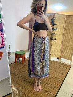 This unique wrap skirt is a one of a kind in the hole world ✨ The fabric goes on it's one unique story as it is a  one of a kind recycled vintage silk hand picked from unique places and villages 🌱 The fabric also  is so soft and silky and has so many small details that make just that much more Beautiful  ⚛️ It's a 2 in 1 skirt ! As you can where it in its 2 defrent sides✨ Skirt is great for every day, And also luxurious and Stunning for evening where. 🌞 Fabric is is the best thing about it, An Bohemian Skirt For Festivals, Bohemian Asymmetrical Maxi Skirt, Bohemian Festival Skirt, Bohemian Asymmetrical Lined Maxi Skirt, Bohemian Long Wrap Skirt With Lining, Hippie Style Flowy Wrap Skirt For Festival, Bohemian Maxi Skirt For Festivals, Bohemian Purple Maxi Skirt For The Beach, Flowy Purple Maxi Skirt For Beach