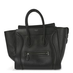 This is an authentic CELINE Drummed Calfskin Mini Luggage in Black. This chic travel tote is crafted of calfskin leather in black. The bag features rolled leather top handles, expandable sides, a facing zipper pocket and a top overextended zipper. This opens to a spacious black interior with zipper and patch pockets. Black Calf Leather Satchel With Leather Handles, Black Textured Calf Leather Satchel, Black Calf Leather Bag With Palladium Hardware, Black Calf Leather Shoulder Bag For Travel, Black Calf Leather Satchel With Top Carry Handle, Black Calf Leather Satchel With Top Handle, Luxury Black Calf Leather Satchel, High-end Black Calf Leather Bag, Designer Black Calf Leather Satchel