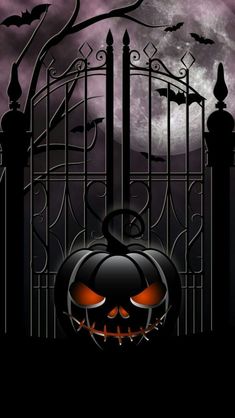 an image of halloween pumpkins in front of a gate with the moon behind it