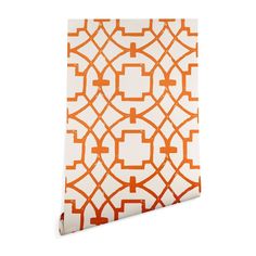 an orange and white wallpaper with geometric design on it's side, in the shape of a trellis