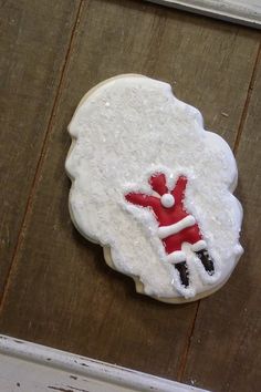 a decorated cookie with a santa clause on it