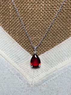 Beautiful Red Ruby Gemstone Teardrop Pendant, 20" inches long, but also available is 18", 24", 30" no additional cost, buyers preference.  FREE SHIPPING IN THE USA,  $11 Everywhere else. The Gemstones are from the "Top Crust" of the mine, which means they have not had the thousands of years of the Earth's pressure the Gemstones further down have had, so they are not as hard or as clear, but are affordable and nice. Classic Red Teardrop Pendant Jewelry, Red Drop Gemstone Jewelry, Red Gemstone Drop Jewelry, Red Teardrop Gemstone Necklace, Red Teardrop Gemstone Drop Necklace, Classic Red Pear-shaped Jewelry, Classic Red Teardrop Pendant Necklace, Red Gemstone Drop Necklace For Gift, Red Teardrop Gemstone Jewelry