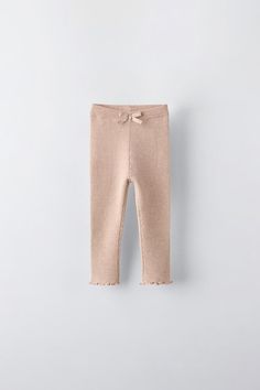 RIBBED BOW LEGGINGS - Beige-pink | ZARA United States Fall Ruffled Bottoms For Loungewear, Spring Loungewear Footless Bottoms, Fall Loungewear Bottoms With Ruffles, Elastic Leggings For Spring Loungewear, Solid Color Leggings For Spring, Casual Ruffled Bottoms For Winter, Footless Leggings For Spring Loungewear, Spring Footless Leggings With Elastic Waistband, Spring Footless Pants With Elastic Waistband