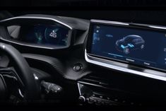 the interior of a car with an electronic display