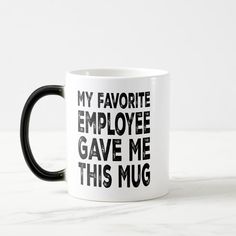 a black and white coffee mug that says, my favorite employee gave me this mug