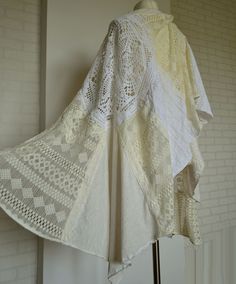 Beautiful lace wedding/special occasion cape. Large patchwork shawl/wrap made of cotton and lace. (hand crocheted doilies, cotton lace, cotton, cotton knitwear) Colors - shades: white, ecru Measurements taken flat : length : 210 cm ( 82,7 in ) width : 64-85 cm ( 25,2 - 33,5 in ) Bohemian Cotton Lace Patchwork, White Handmade Shawl For Spring, Handmade Lace Shawl In White, Handmade White Shawl For Spring, Handmade White Lace Shawl, Beige Bohemian Cotton Shawl, Cream Bohemian Lace With Lace Trim, Bohemian Cream Lace With Lace Trim, White Cotton Lace In Bohemian Style