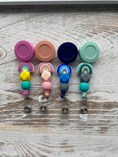 Boho Rainbow Silicone Beaded Badge Reel. Show your individual style with these super cute beaded badge reels.   Silicone beads are lightweight, BPA free and easy to clean.   Alligator Swivel Clip. Bead Badge Reel, Beaded Badge Reel, Cheap Beaded Badge Reel As Gift, Badge Reels With Silicone Beads, Multicolor Beaded Badge Reel As Gift, Adjustable Multicolor Badge Reel For Gifts, Adjustable Multicolor Badge Reel For Gift, Pacifier Clips Diy, Multicolor Retractable Badge Reel For Gift