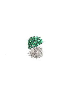 With a classic look inspired by nature. This ring features 3.80ct in emeralds and 2.30ct. t.w. diamonds. Set in 18K White Gold. 18K Gold: 9.00gr Diamonds: 2.30ct Clarity: VS1 - SI1 Color: G - H Emeralds: 4.40ct Dimension: 21mm x 31mm Size: 7 Available in White Gold With natural inclusions, untreated gemstones Contact us to further customize SKU: RI0992 Green Cluster Luxury Ring, Luxury Green Emerald Ring With Baguette Diamonds, Luxury Green Rings With Baguette Diamonds, Luxury Green Multi-stone Emerald Ring, Bypass Ring, Jewelry Website, Inspired By Nature, Classic Looks, Nature Inspiration